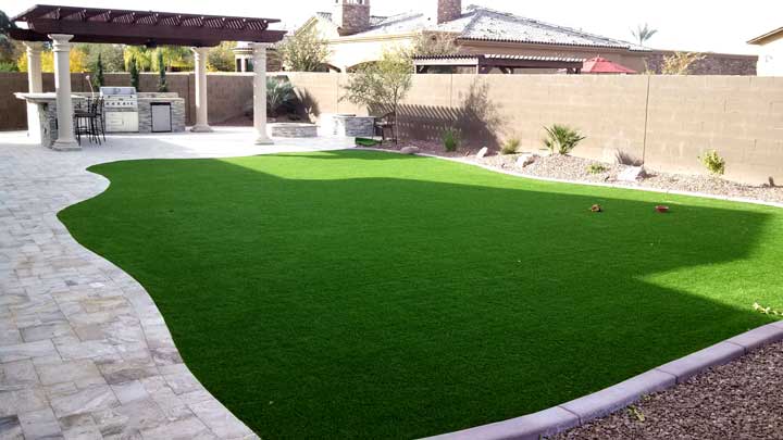 Backyard Landscape with Synthetic grass, travertine tiles, Built-in 