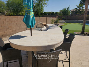 Travertine pavers on BBQ counter top with tile on the face